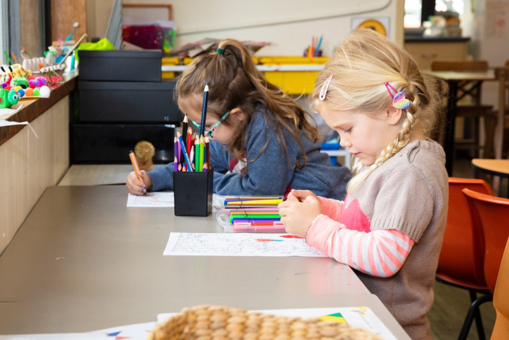 two girls drawing