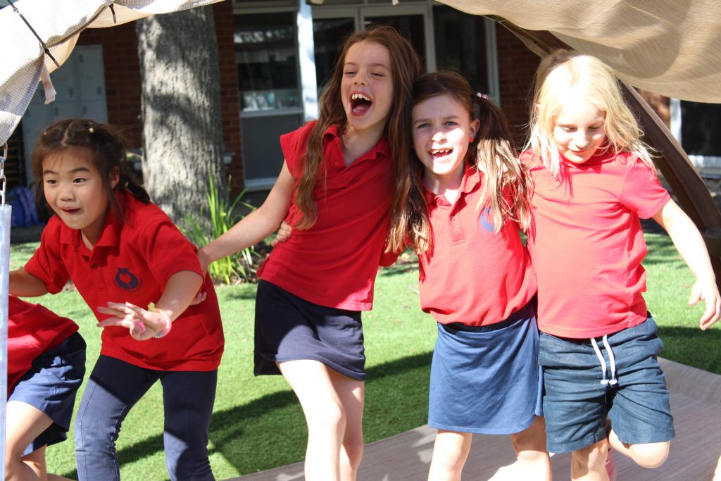 four girls playing