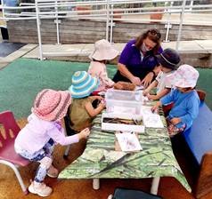 five children with educator